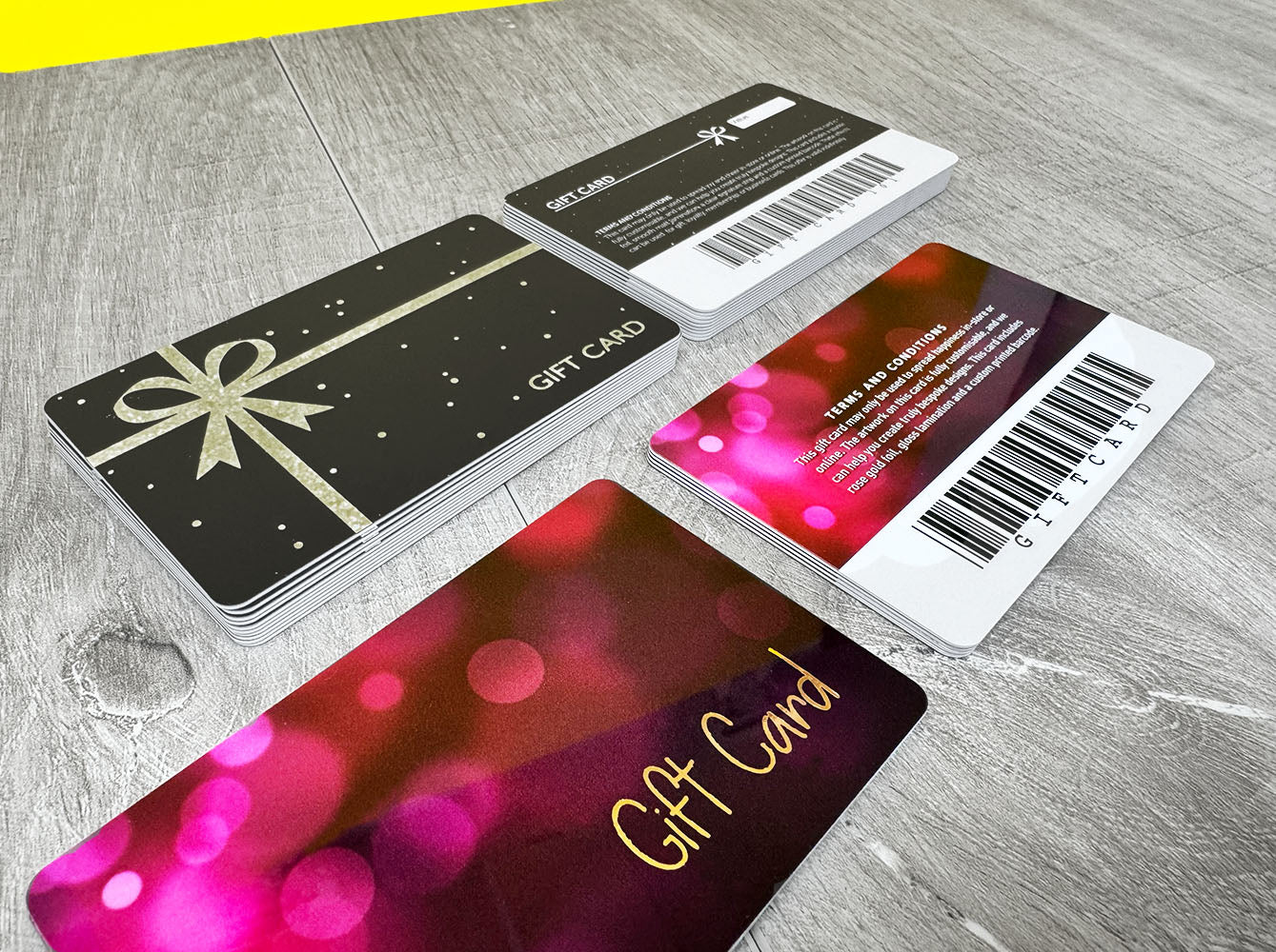 Custom printed gift cards with elegant gold and pink designs